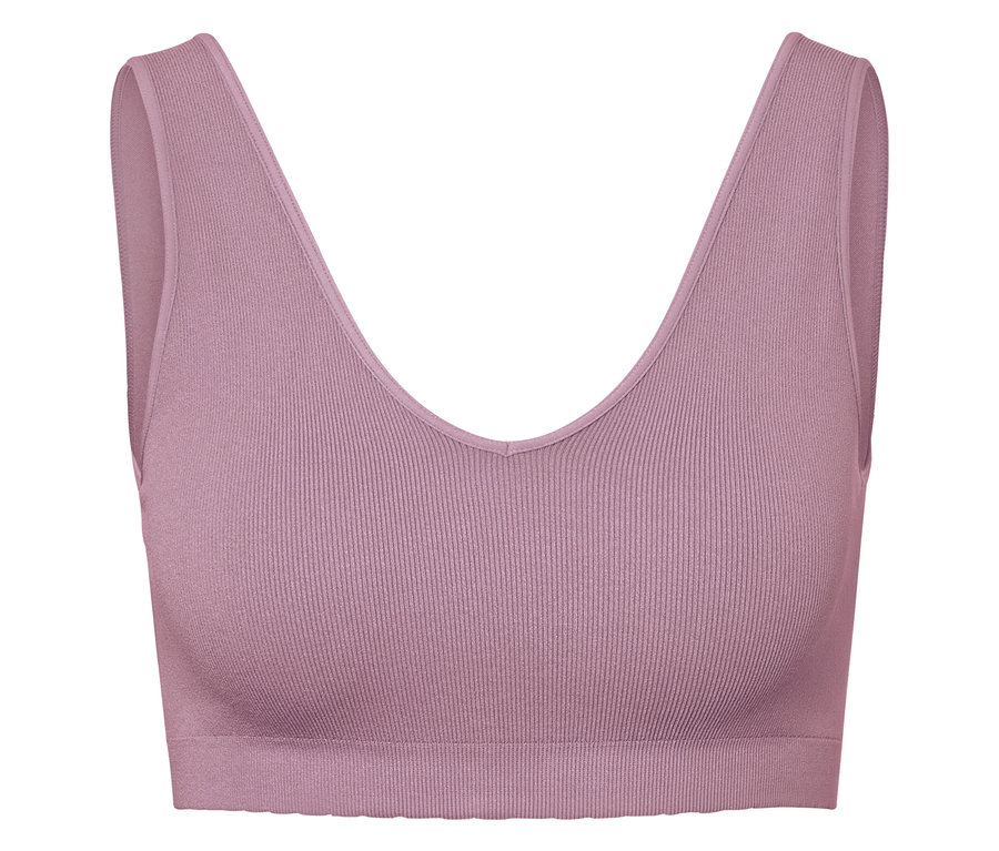 Soutien-gorge de sport rose avec motif côtelé.