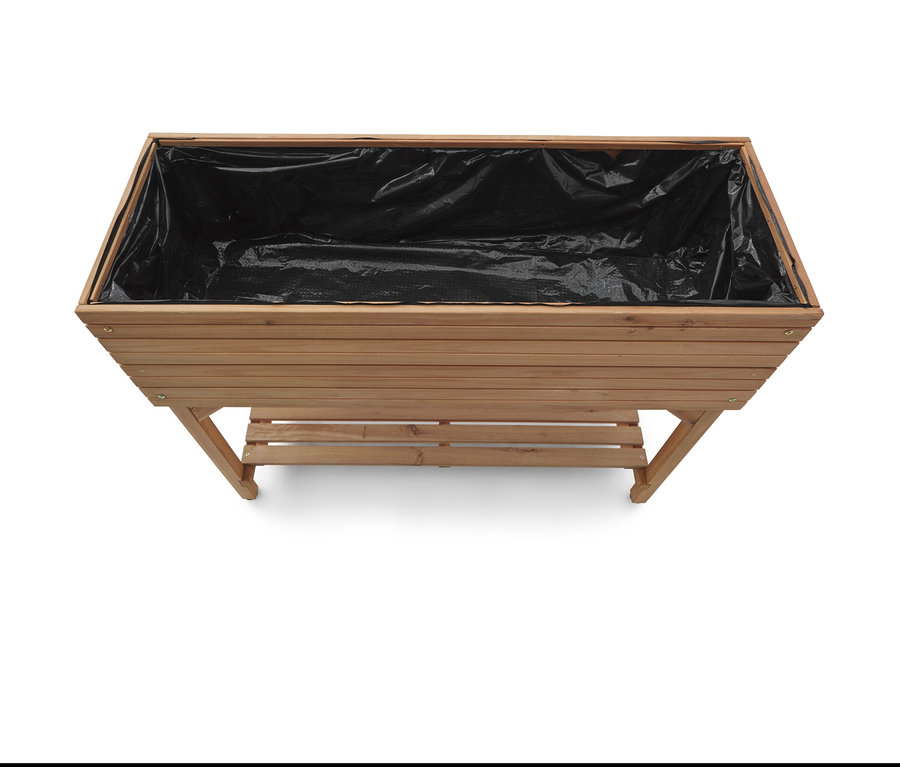Vue de dessus d'une jardinière en bois avec une doublure noire.