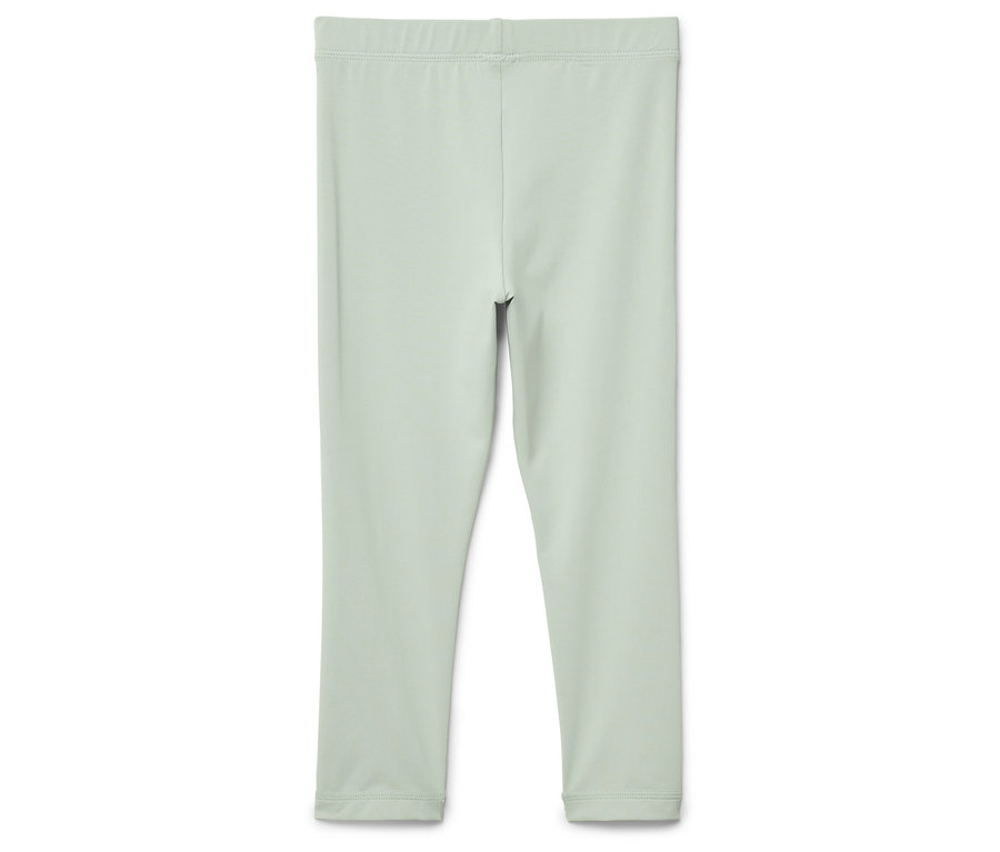 Leggings vert clair sur fond blanc.