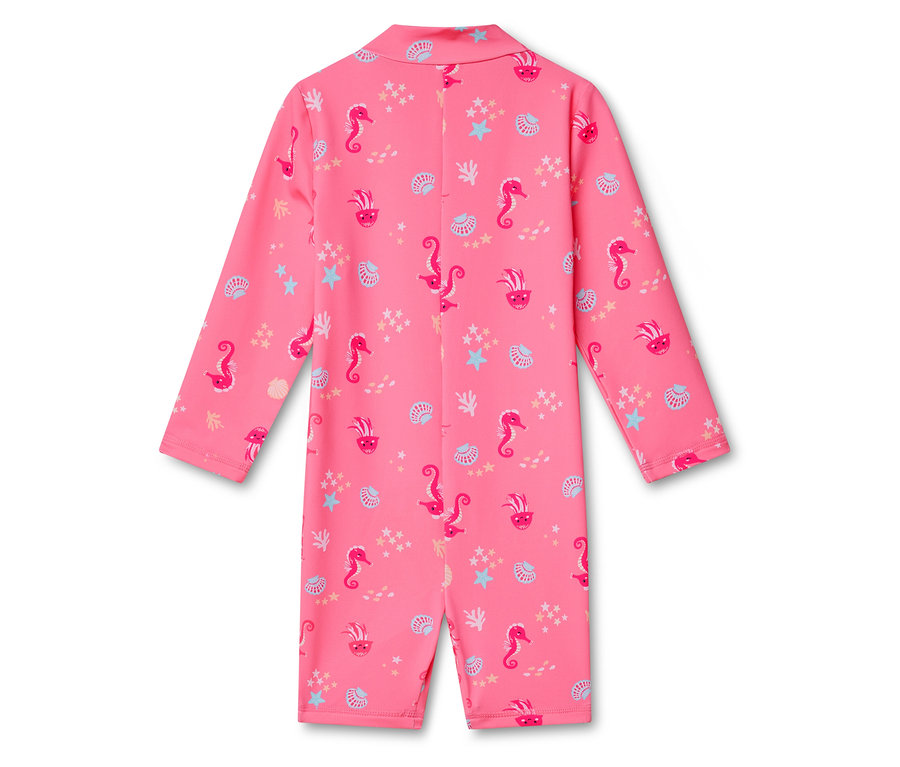 Maillot de bain intégral rose à motifs d'hippocampes, de coquillages et d'étoiles de mer.