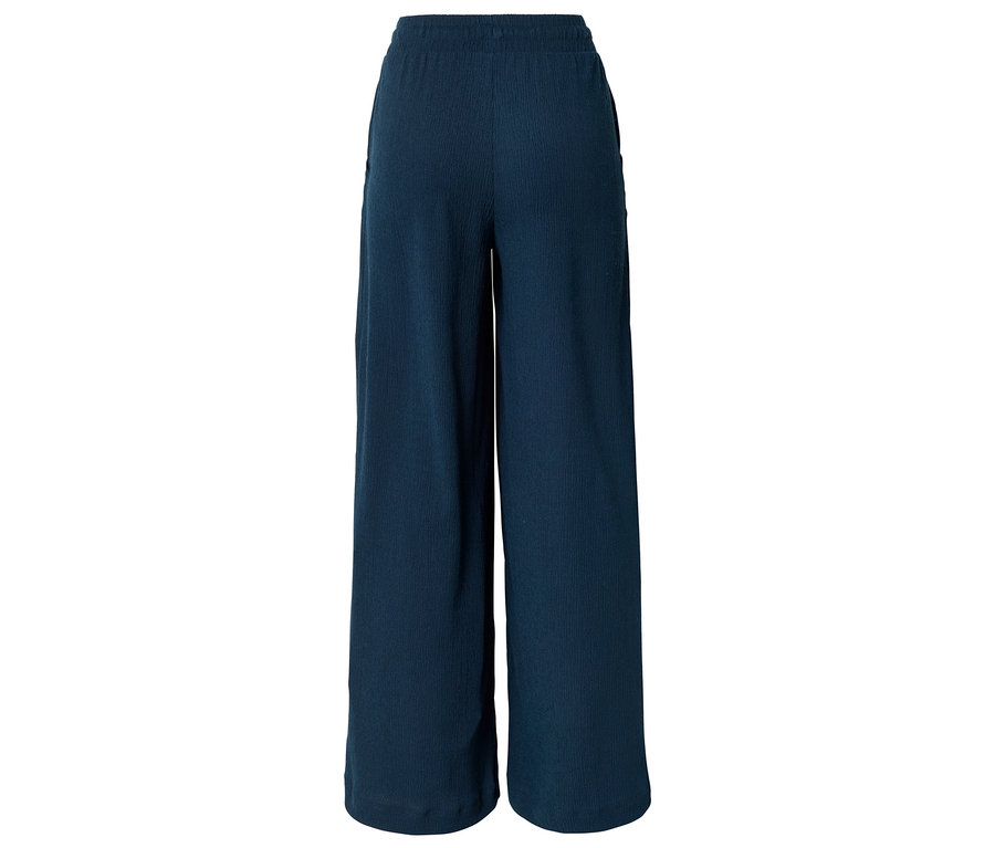 Pantalon large en tissu bleu marine avec taille élastique et poches, photographié de dos.