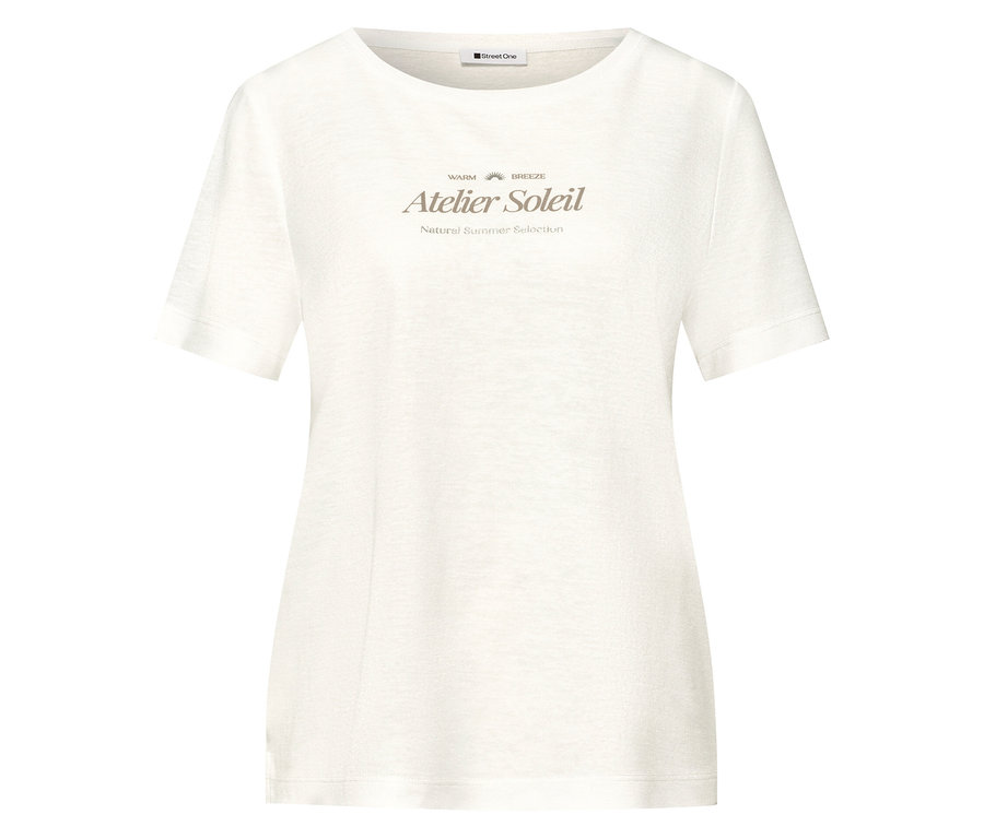 Un t-shirt blanc avec l'inscription "Atelier Soleil" est visible sur un fond blanc.