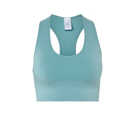 Gros plan d'une brassière de sport turquoise avec dos nageur.