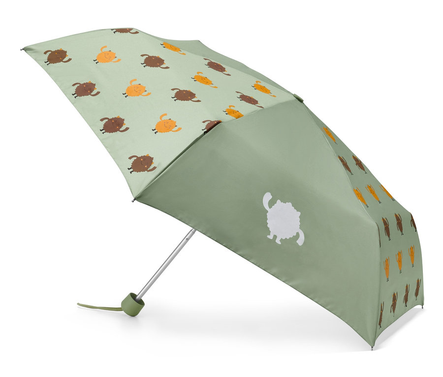 Un parapluie de poche vert avec un motif de monstres.