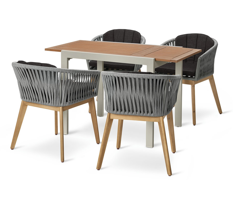 Quatre fauteuils pour table à manger avec tressage textile entourent une table à rallonge «
A ».