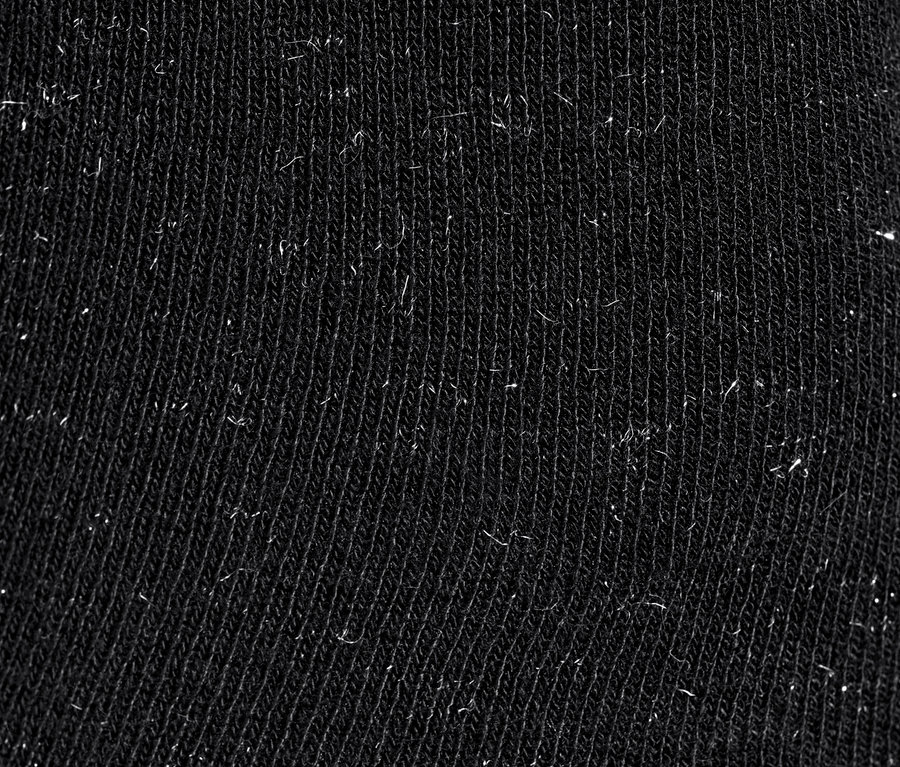Gros plan sur des collants en tricot noirs (2 paires).