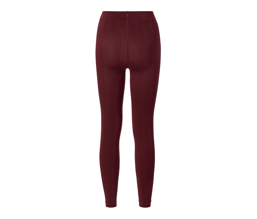 Legging thermique bordeaux à motif torsadé.