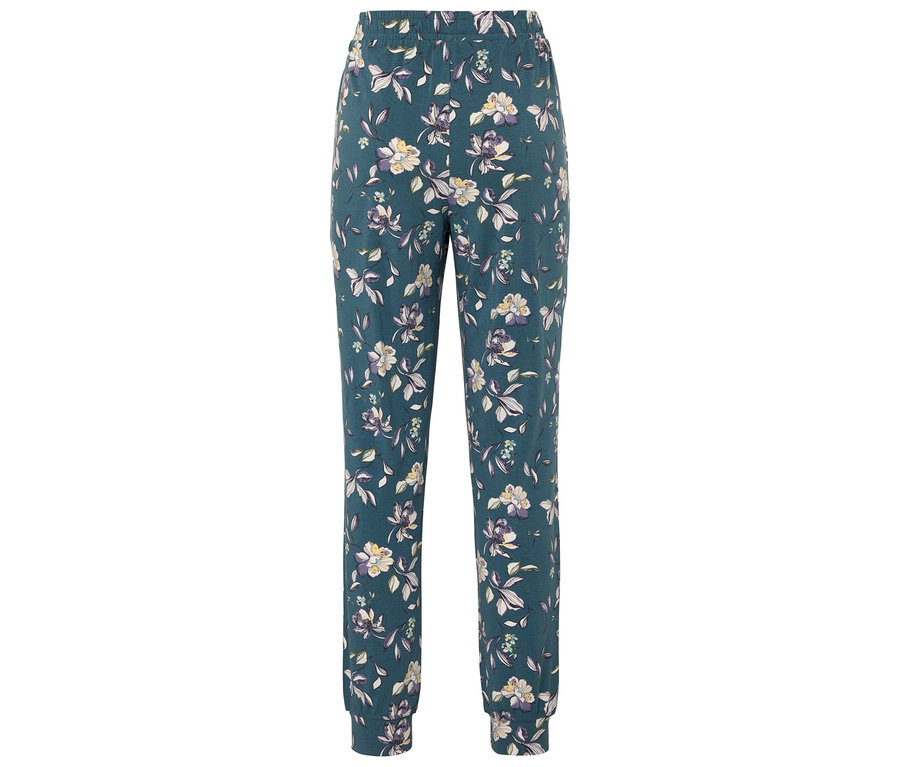 Un pantalon vert foncé avec un motif floral.