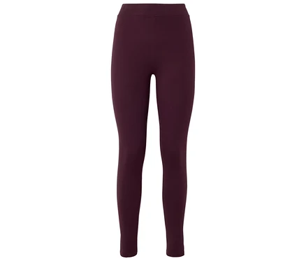 Un legging bordeaux sur un fond blanc.