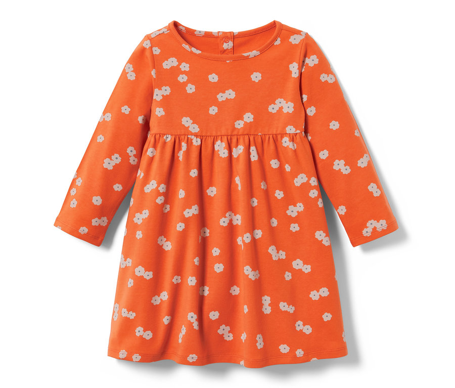Une robe en jersey orange à manches longues pour tout-petit avec un imprimé floral.