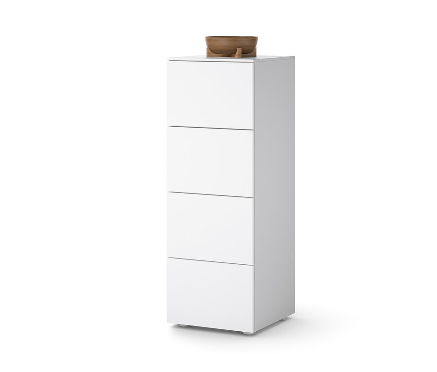 Commode blanche avec quatre tiroirs et un bol en bois sur le dessus.