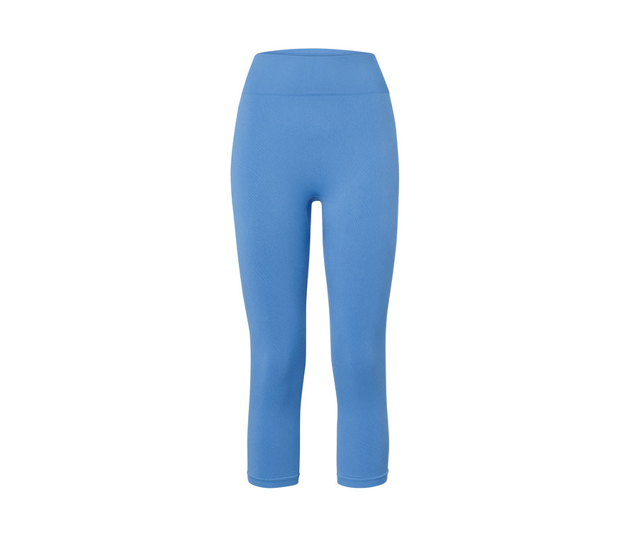 Un collant de sport 3/4 Seamless bleu sur fond blanc.
