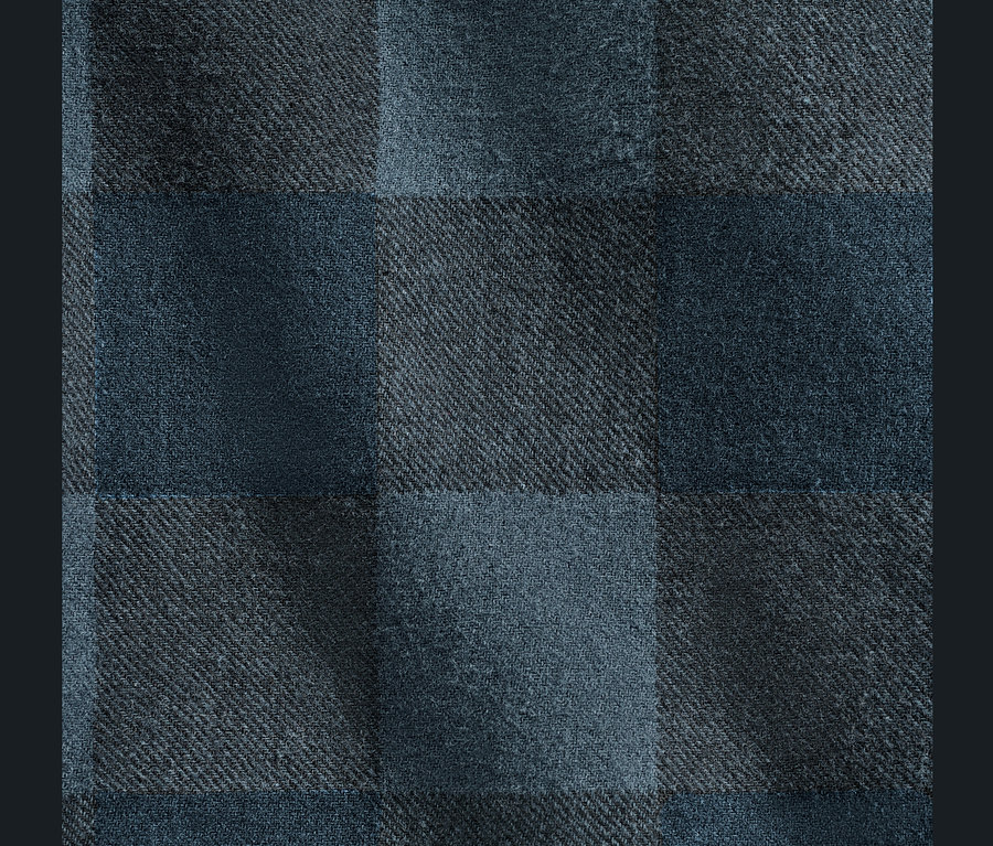 Gros plan d'un motif à carreaux bleus.
