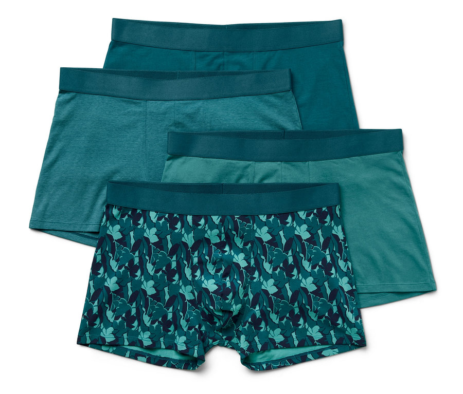 Quatre boxers, imprimé intégral en différentes nuances de vert et de bleu superposés.
