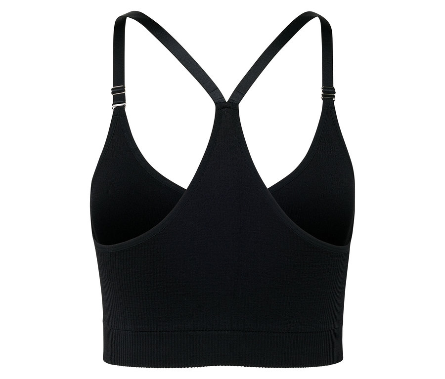 Gros plan d'un soutien-gorge de sport noir à fines bretelles.