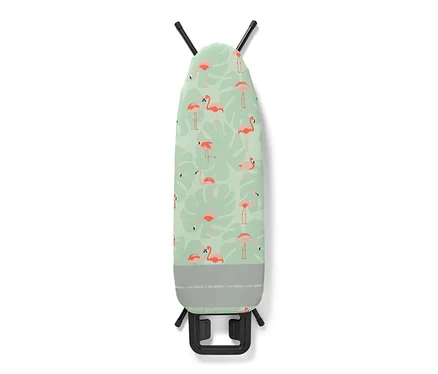 Housse pour planche à repasser avec motif flamants roses sur fond vert.