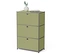 Une armoire verte avec trois tiroirs sur laquelle reposent un vase avec une plante et un livre.