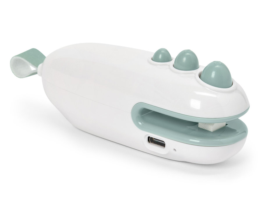 Gros plan d'une lime à ongles électrique blanche et verte.