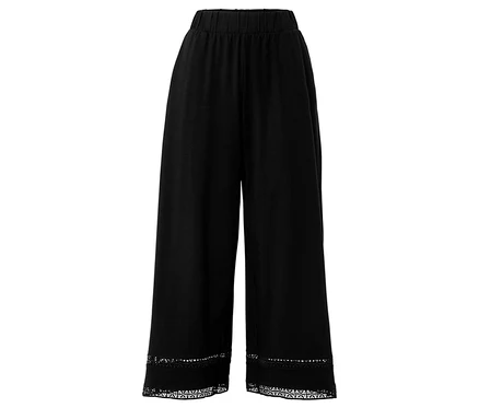 Pantalon culotte noir avec taille élastique et bordure en dentelle à l'ourlet.