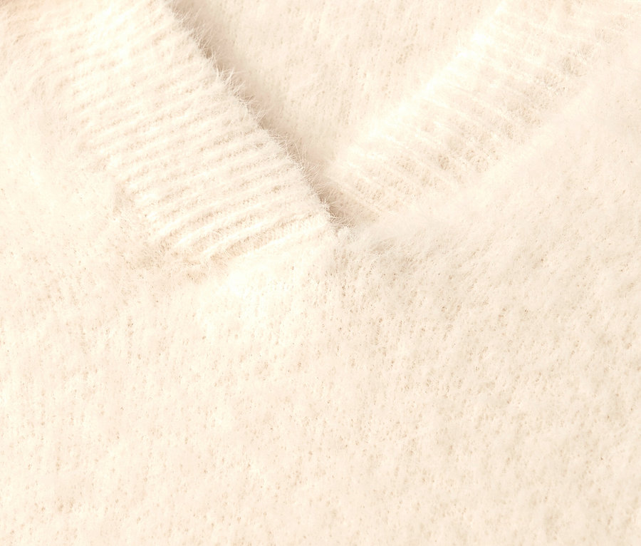 Gros plan sur un pull en maille à col polo Street One.