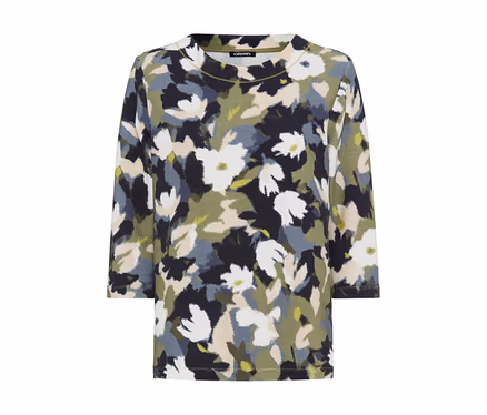 Haut à manches longues avec un motif floral abstrait blanc, noir, vert et beige.