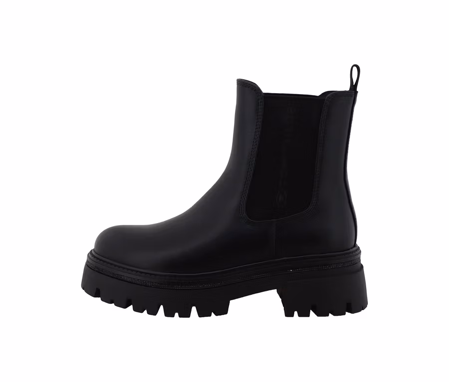 Bottine noire Tom Tailor avec empiècements élastiques et semelle crantée épaisse.