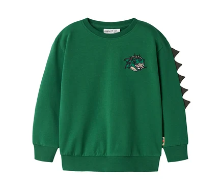 Sweat-shirt vert à manches longues avec une tête de dragon de dessin animé brodée sur la poitrine et des pointes triangulaires noires le long de la manche droite.