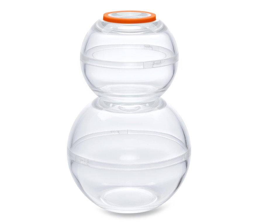 Une boule de conservation transparente composée de deux sphères transparentes avec un couvercle orange.