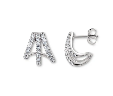 Deux boucles d'oreilles créoles triples en argent 925 sur fond blanc.