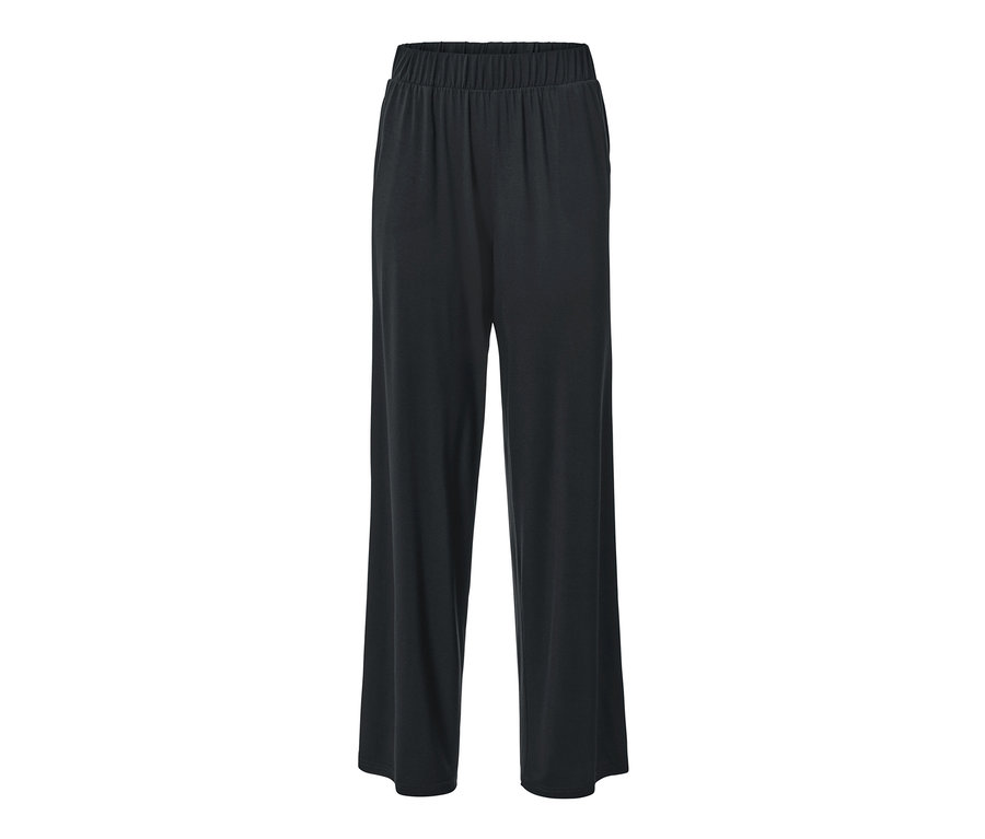 Un pantalon palazzo noir sur fond blanc.