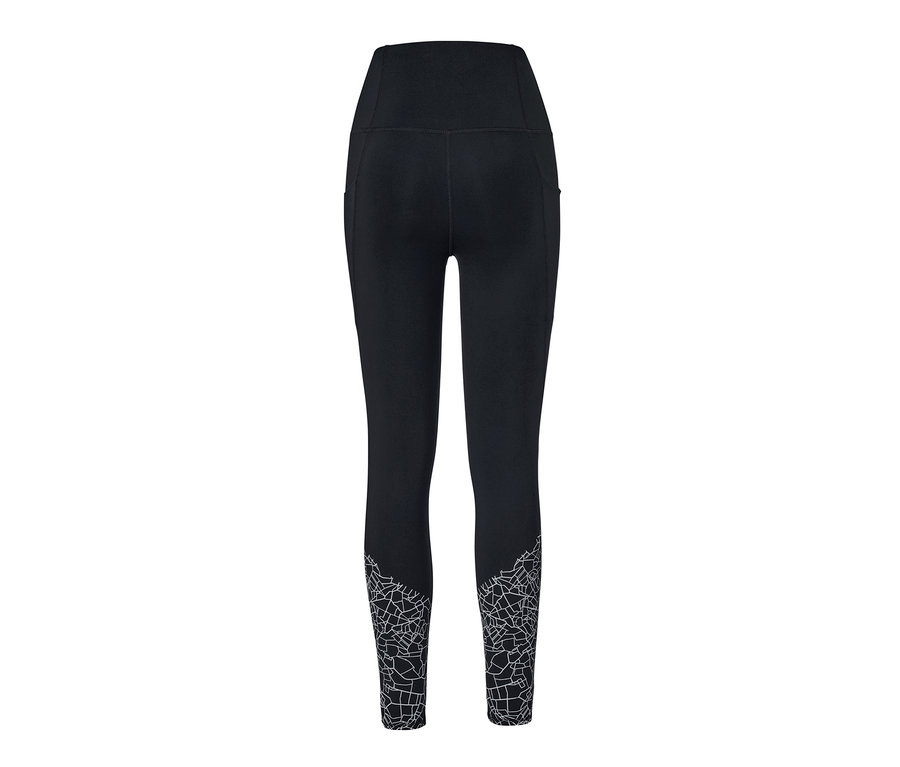 Legging de sport noir avec motif sur le bas des jambes.
