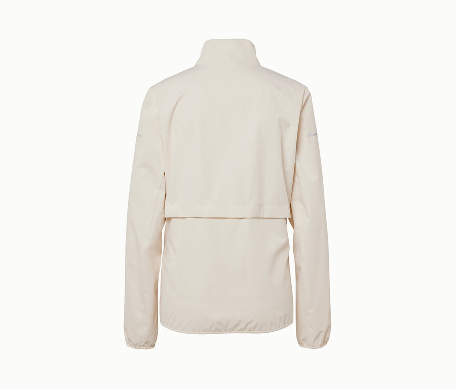 Veste de sport coupe-vent crème vue de dos.