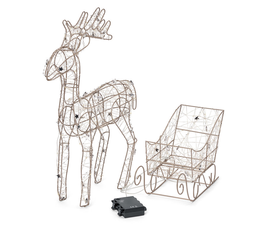 Renner et traîneau en fil de fer avec des étoiles et une batterie noire sur fond blanc.