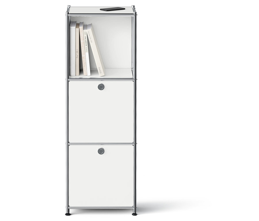 Module de rangement blanc avec deux tiroirs et une étagère supérieure ouverte avec des livres et un téléphone.