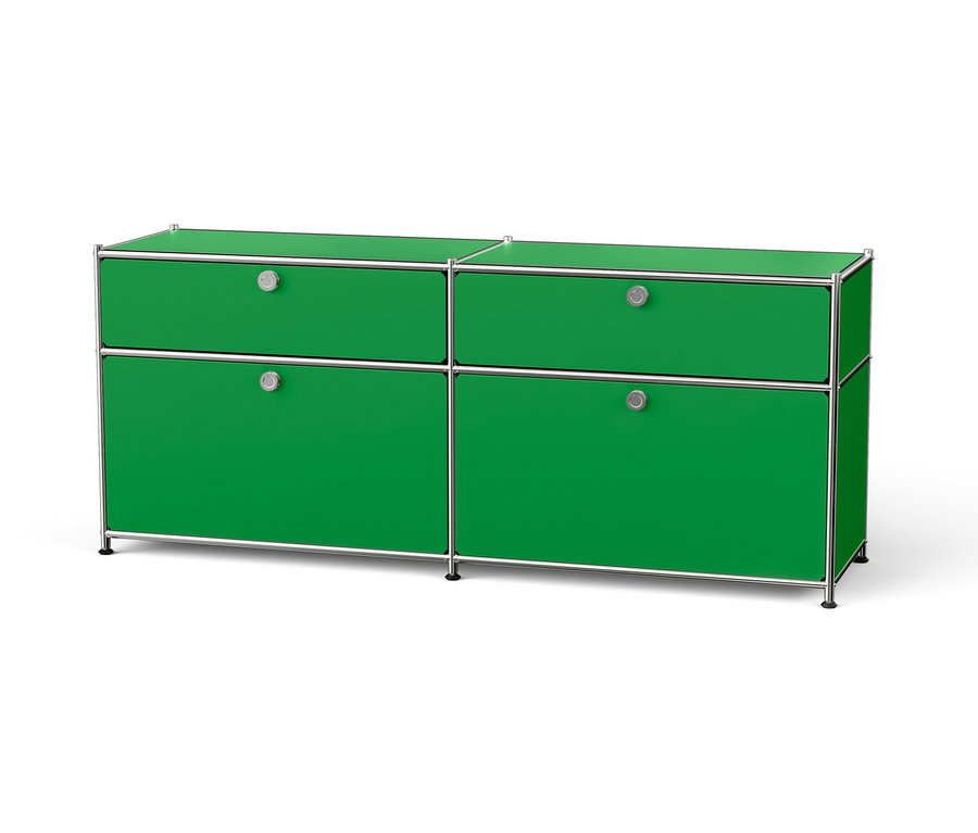 Commode verte avec quatre tiroirs et cadre argenté.