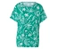 T-shirt vert avec motif tropical blanc.