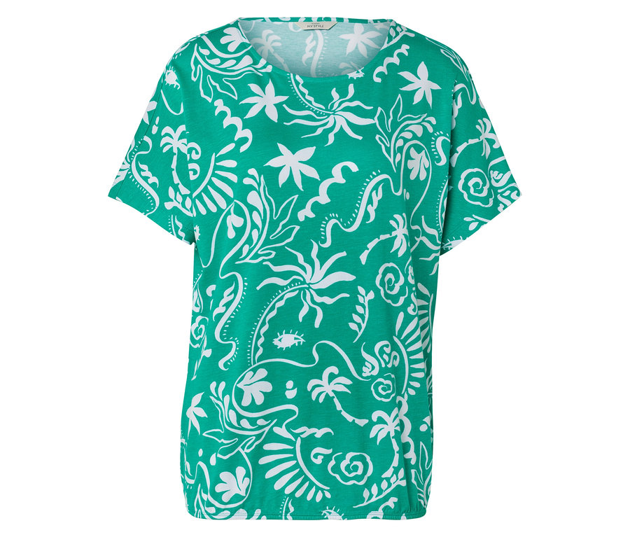 T-shirt vert avec motif tropical blanc.