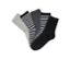 Cinq paires de chaussettes en gris, noir et blanc.