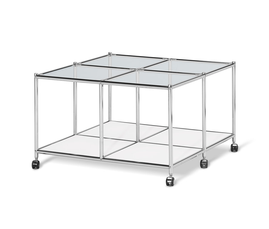 Table basse à roulettes « CN3 », blanche, avec structure chromée et plateau en verre.