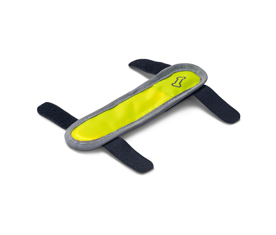 Bande lumineuse à LED jaune pour chien avec quatre sangles de fixation noires sur fond blanc.