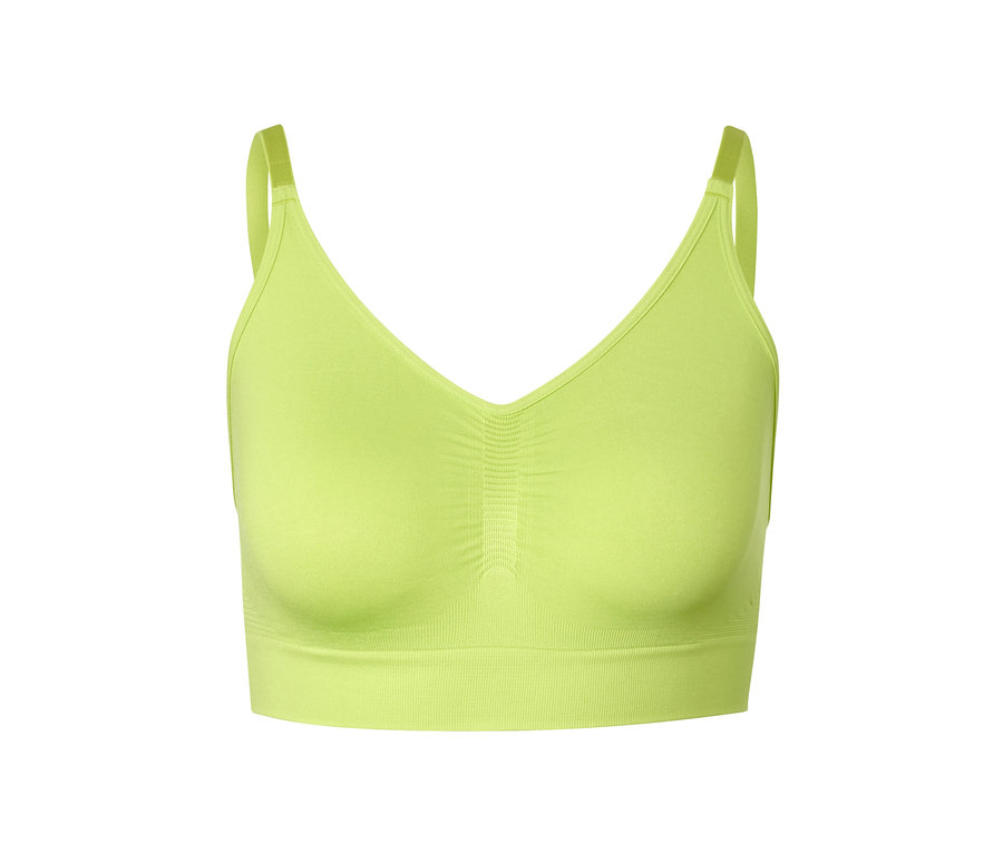Une brassière de sport sans coutures verte.