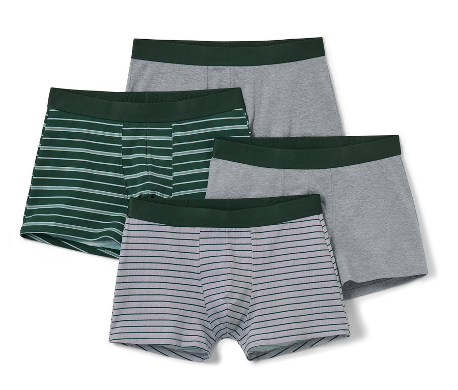 Quatre boxers : un vert rayé, un gris rayé et deux gris.
