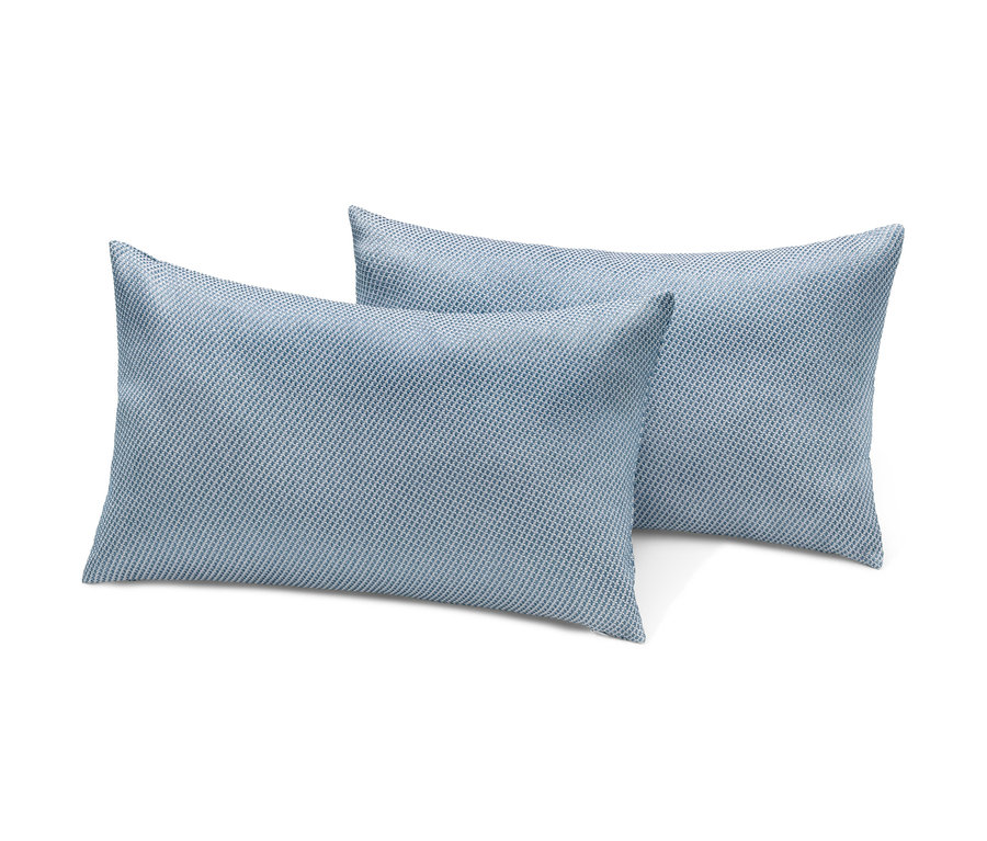 Deux coussins d’extérieur à structure tissée.