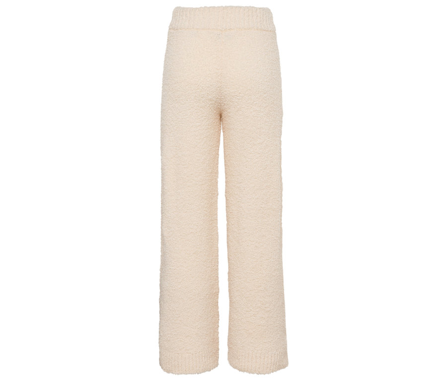Pantalon beige duveteux sur fond blanc.