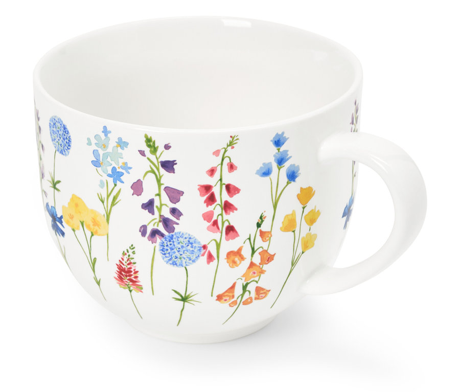 Tasse blanche avec motif floral.