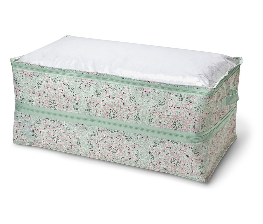 Un espace de rangement Jumbo avec un rembourrage blanc sur le dessus.