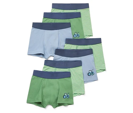 Six boxers pour enfants dans les tons de vert et de bleu, certains avec des motifs de tracteurs et des rayures.