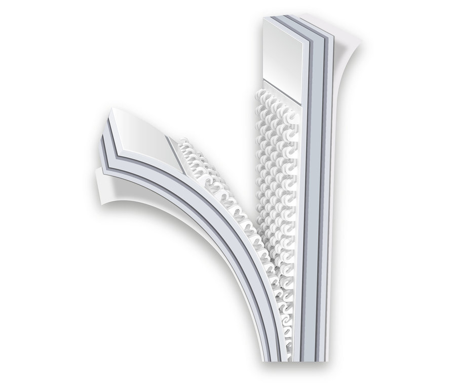 Gros plan d'un matelas à trois couches montrant les couches internes.