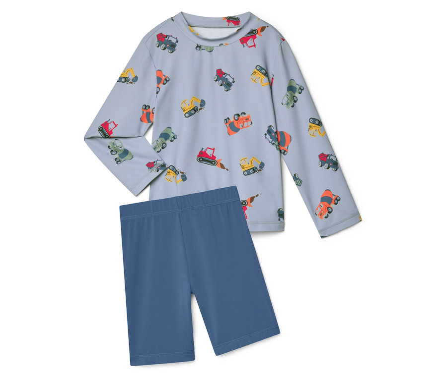 Haut à manches longues bleu clair avec imprimé d'excavatrice et leggings courts bleus assortis.