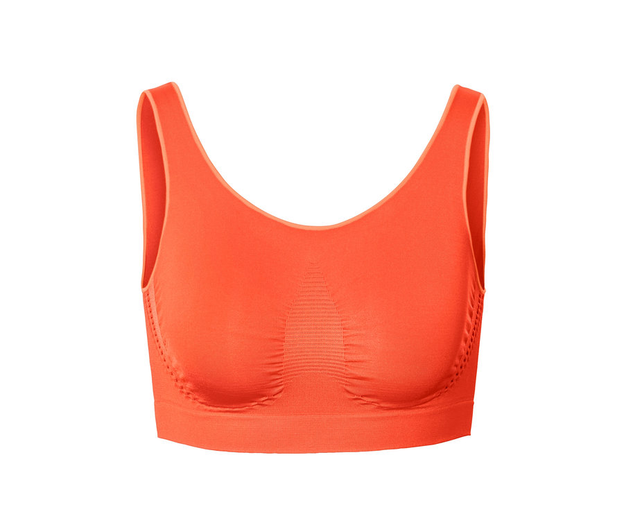 Brassière sans coutures orange sur fond blanc.